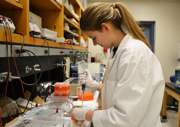 Huron senior Lilia Popova works on her research at a lab in the University of Michigan Kraus Building of Natural Science Feb. 1, 2013.