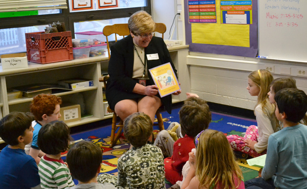 AAPS Superintendent Dr. Patricia Green reads one of her favorite books at Bach Elementary's Family Reading Night March 22.