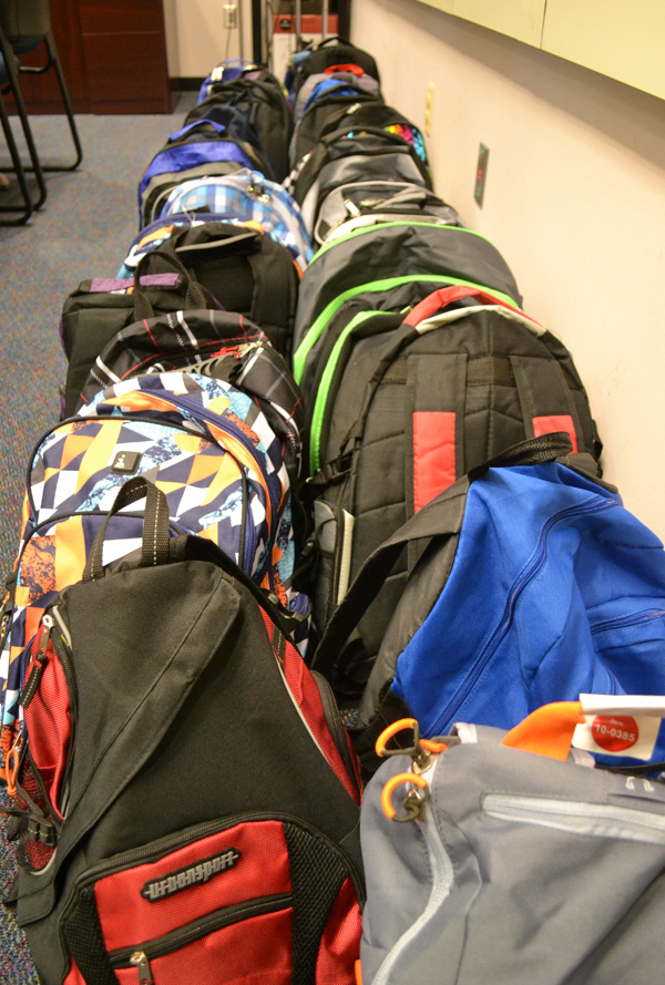 Local businesses, organizations donate backpacks to AAPS students ...