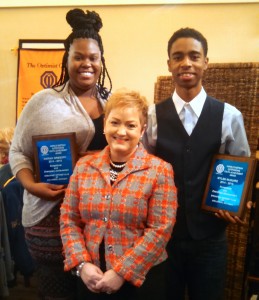 AAPS Superintendent Jeanice Swift congratulates Skyline students Mariah Gregory and Myles McGuire for winning the Harold Eastman Outstanding Youth Achievement Award from the Breakfast Optimist Club of Ann Arbor.