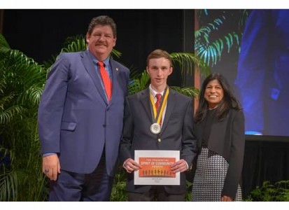  NASSP President Michael Allison and Latta Reddy, President, Prudential Foundation present Michigan High School honoree Trip Apley the Prudential Spirit of the Community Award at the Smithsonian Natural History Museum in Washington DC. 