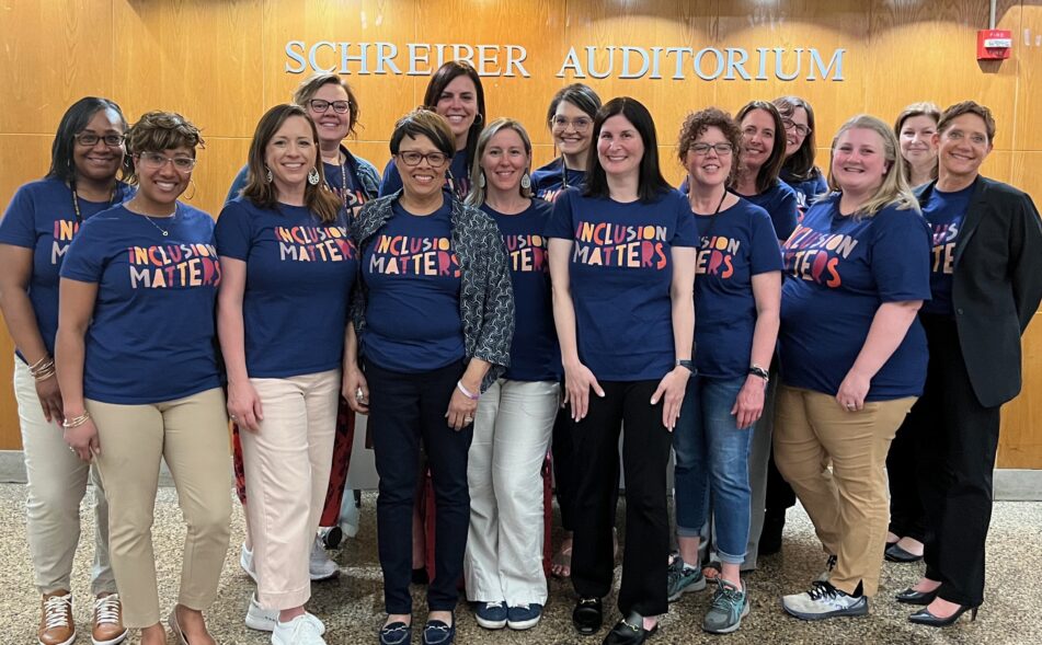 AAPS Office of Special Education team, and filmmaker Lara Stolman wearing Inclusion Matters shirts.