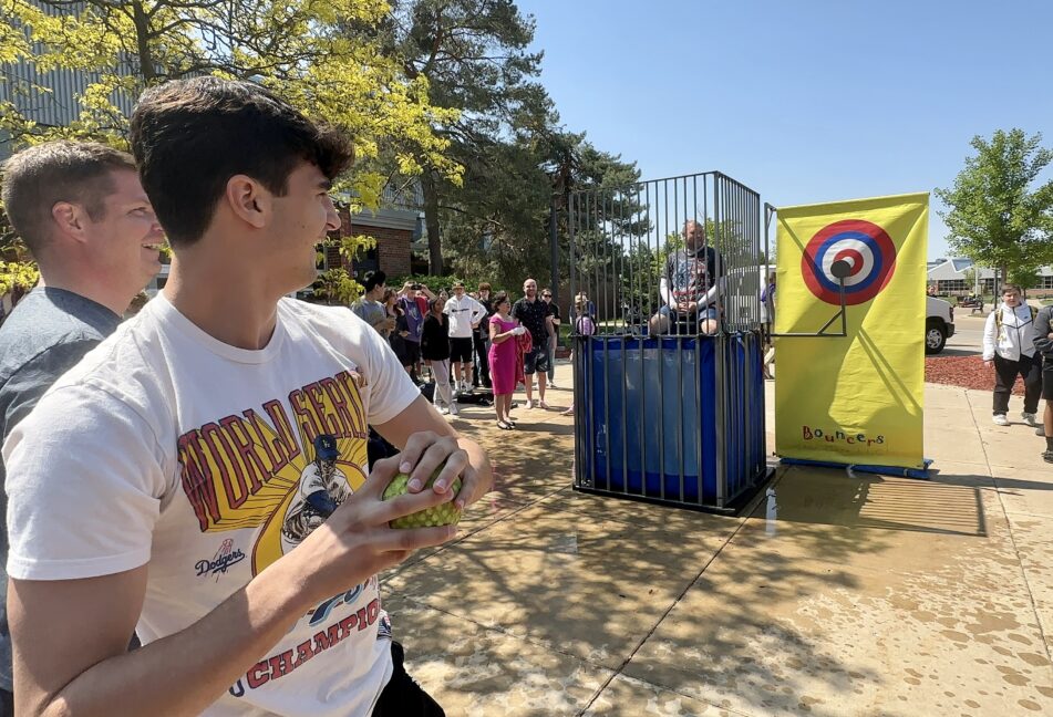 Teachers brave the dunk tank on Disability Awareness Day to raise money for  senior heading for the Special Olympics World Games – AAPS District News