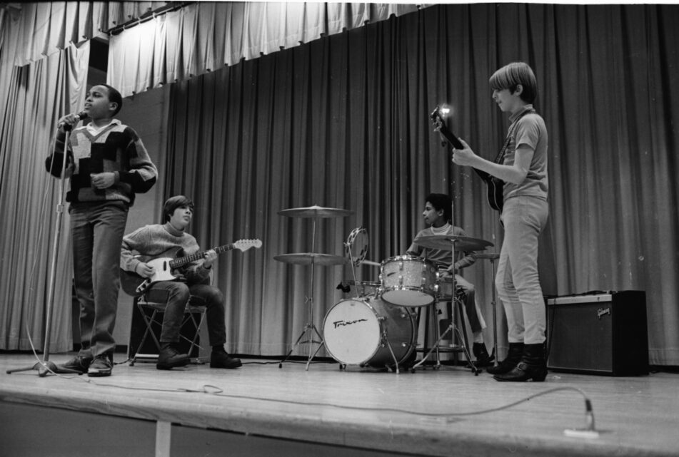 Mike Shaw, Matt Becker, Haywood Hall, and Tim Connor perform at Forsythe Junior High School's Talent Show, January 1969