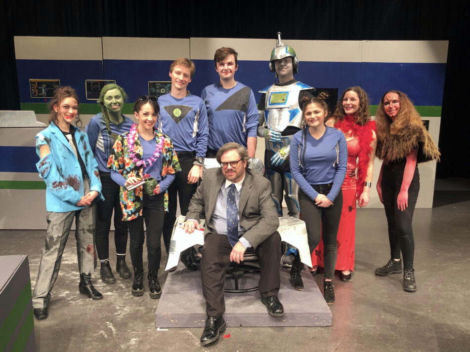 Brockie (seated at center) with the cast of Skyline Theatre's February 2020 production of his original script, "Pardon My Spaceship."