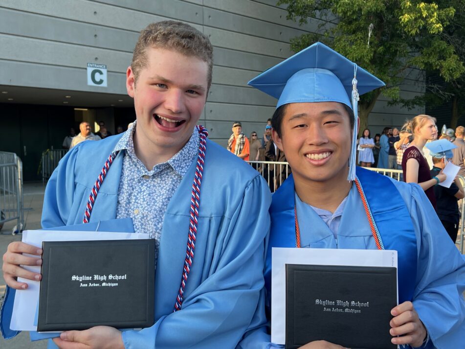 Two male Skyline Grads after the ceremony.