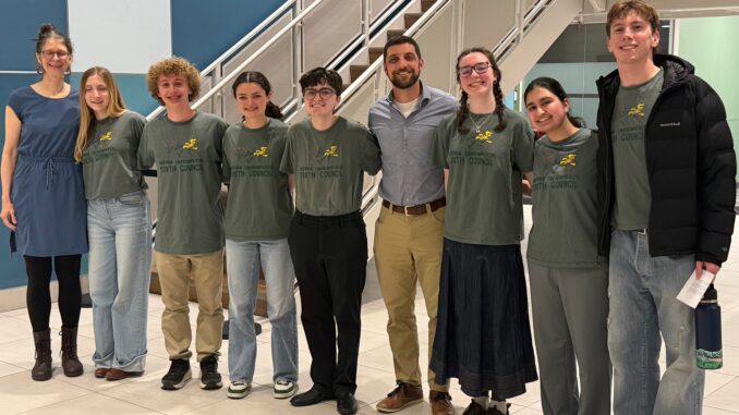 Members of the Freeman Environmental Youth Council and teachers Coert Ambrosino and Sarah Hill after presenting to the Board of Education