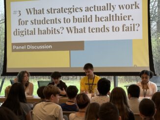University of Michigan students talk to 6th graders during panel discussion at Digital Wellness Expo
