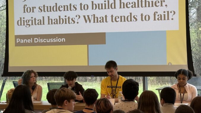 University of Michigan students talk to 6th graders during panel discussion at Digital Wellness Expo