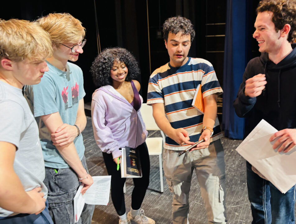 (From left) Chicago: Teen Edition cast members Tanner Bean, Simon Schroeder, and Gabby Thompson receive direction from co-directors Ethan Steiner and Burke Brickner. (photo credit: Quinn Strassel)