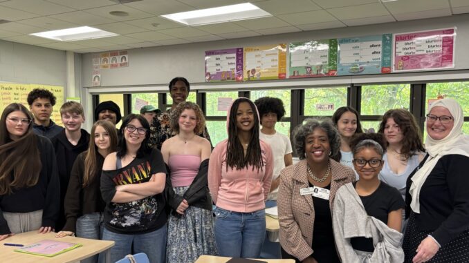 MDE Director of the Office of Educational Supports, Corinne Edwards visits Melissa Saeed's classroom full of students