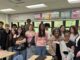 MDE Director of the Office of Educational Supports, Corinne Edwards visits Melissa Saeed's classroom full of students