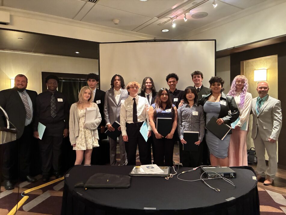 The PM class that worked on this year's house at the annual banquet.