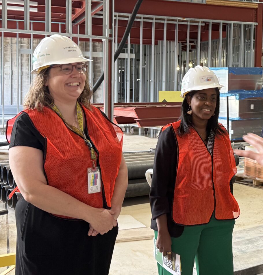 Samantha Cucu and Superintendent Jazz Parks in what will become new Mitchell's cafeteria.