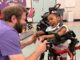 Staff and student share a laugh during AAPS' ESY program on July 8, 2026